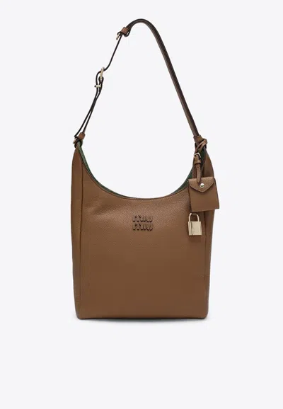 Miu Miu Hammered Leather Bucket Bag In Brown