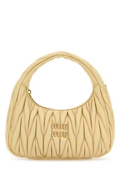 Miu Miu Handbags. In Yellow