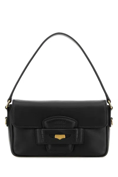 Miu Miu Handbags. In Black