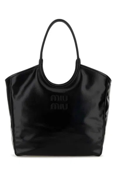 Miu Miu Handbags. In Black