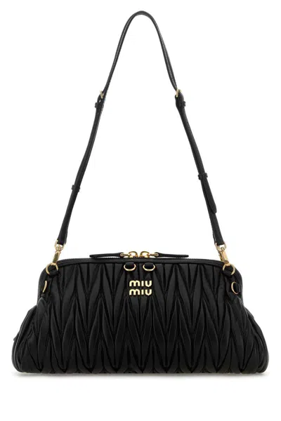Miu Miu Handbags. In Black
