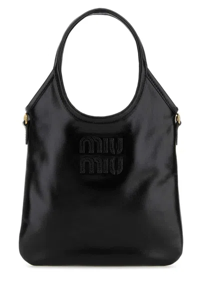 Miu Miu Handbags. In Black
