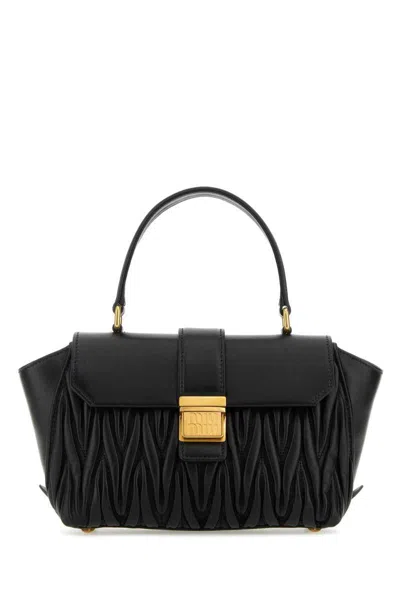 Miu Miu Handbags In Black