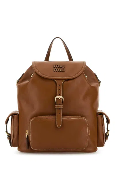 Miu Miu Handbags. In Brown