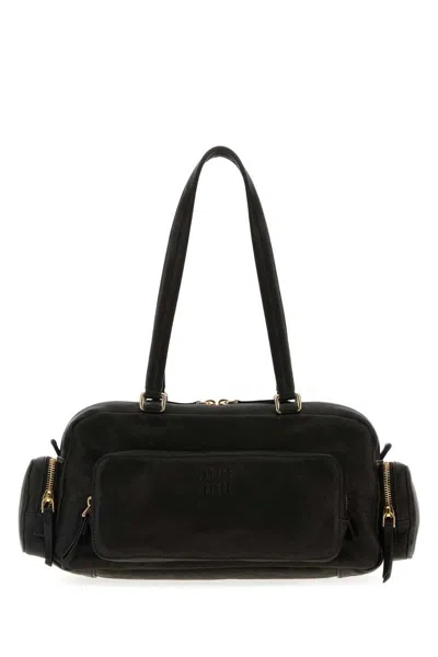 Miu Miu Handbags. In Brown