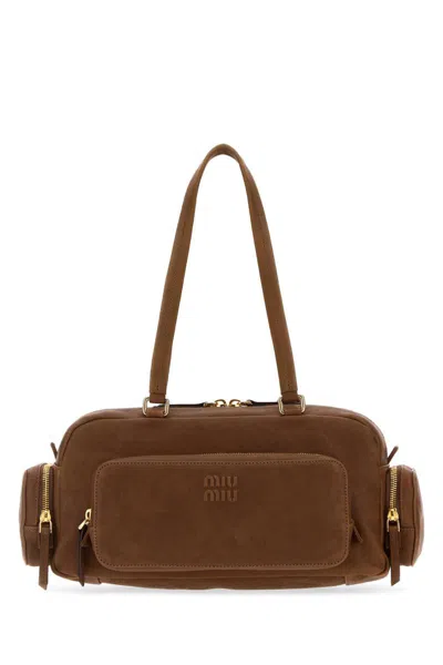 Miu Miu Handbags. In Brown