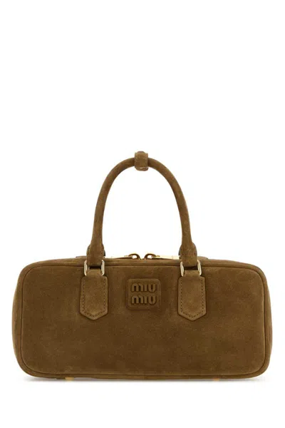 Miu Miu Handbags. In Brown
