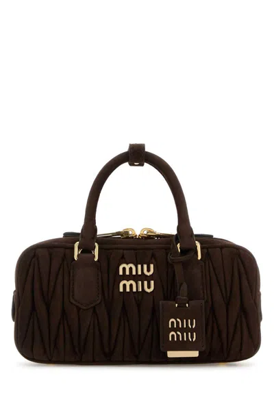 Miu Miu Handbags. In Brown