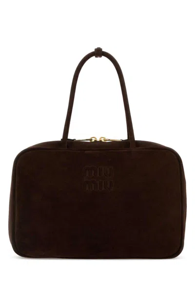 Miu Miu Handbags. In Brown