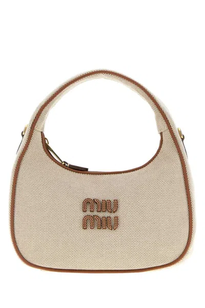 Miu Miu Handbags. In Multi