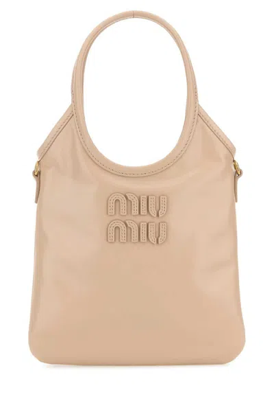 Miu Miu Handbags. In Nude