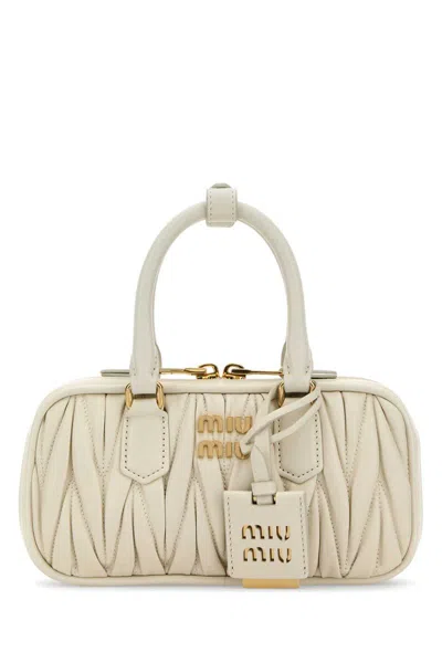 Miu Miu Handbags. In White