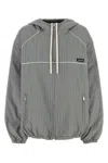 Miu Miu Embroidered Tech Fabric Jacket In Gray