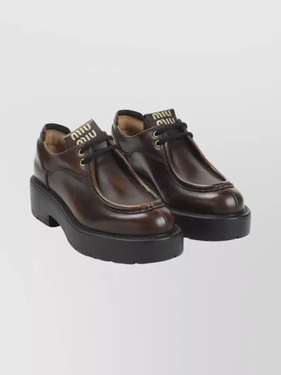 MIU MIU LACE-UP SHOES FEATURING CHUNKY SOLE