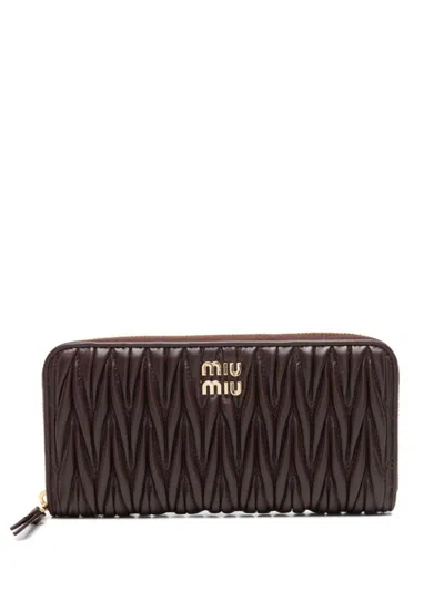 Miu Miu Large Matelassé Leather Wallet In Brown