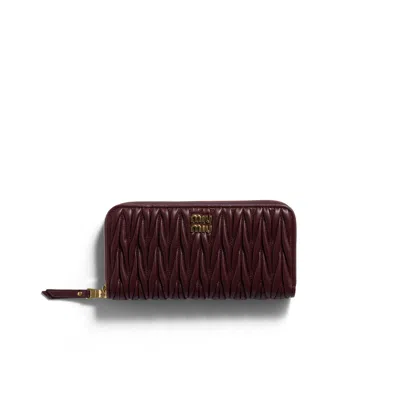Miu Miu Large Matelassé Nappa Leather Wallet In Burgundy