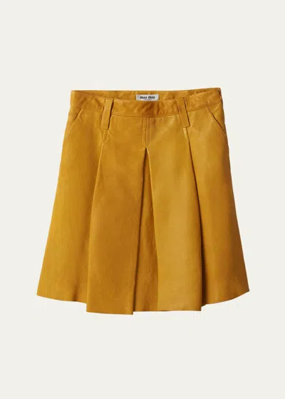 Miu Miu Large Pleated Midi Leather Skirt In Gold