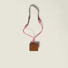Miu Miu Leather And Cord Trick In Brown