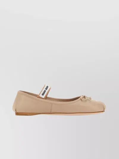 Miu Miu Leather Ballerinas With Round Toe And Bow Detail In Gold