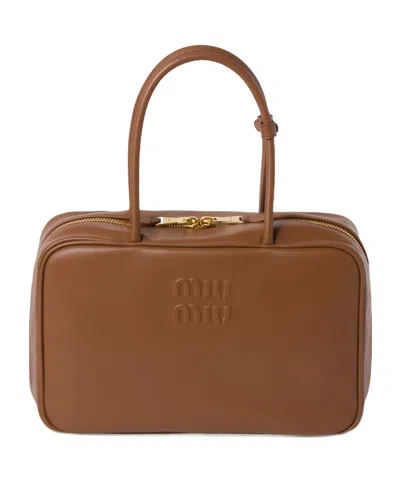 MIU MIU MIU MIU BEAU LOGO-DEBOSSED ZIPPED TOTE BAG