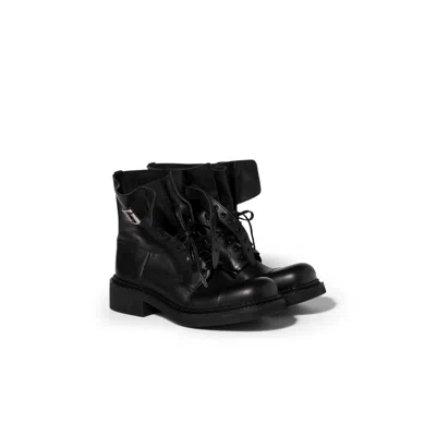 Miu Miu Leather Booties In Black