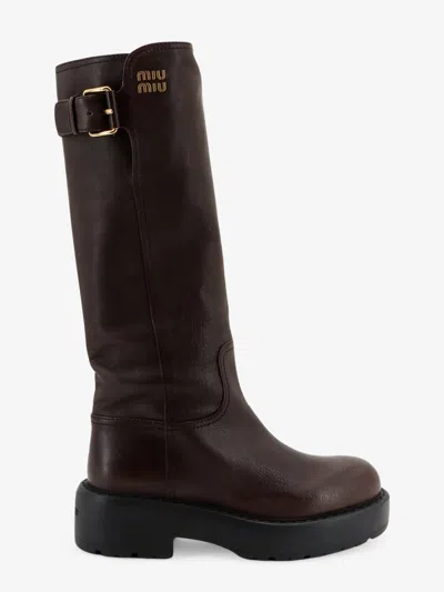 Miu Miu Leather Boots With Embossed Lettering Logo In Brown