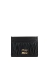 Miu Miu Quilted Black Lamb Leather Compact Wallet In Black