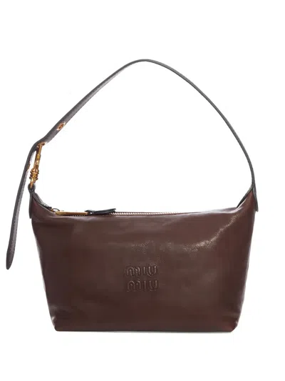 Miu Miu Leather Clutch In Brown