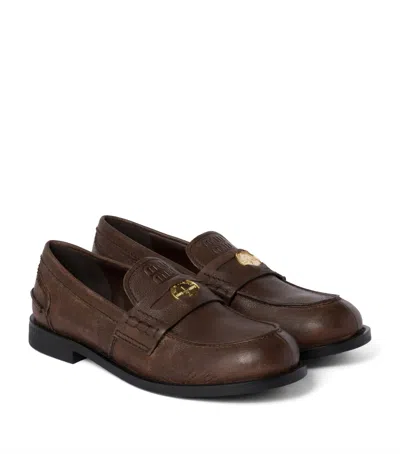 Miu Miu Leather Distressed Penny Loafers In Brown