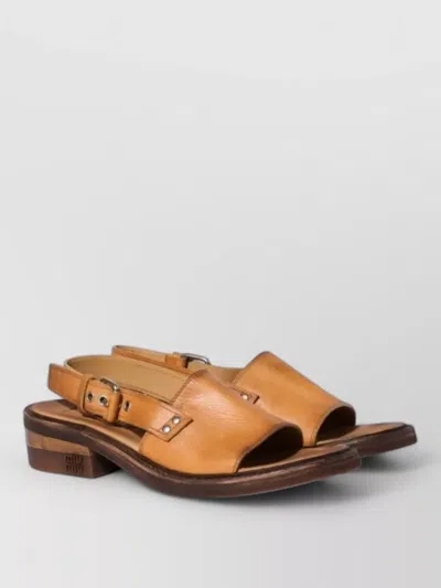 Miu Miu Leather Flat Sole Open Toe Slingback Sandals In Brown