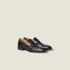 Miu Miu Embossed-logo Leather Loafers In Black