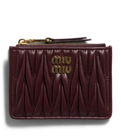 Miu Miu Leather Matelassé Zipped Card Holder In Burgundy