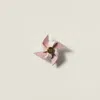Miu Miu Leather Pinwheel Brooch In Pink