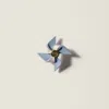 Miu Miu Leather Pinwheel Brooch In Blue