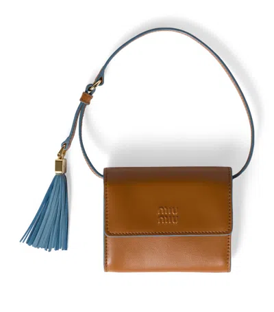 Miu Miu Leather Tassel Chain Wallet In Blue