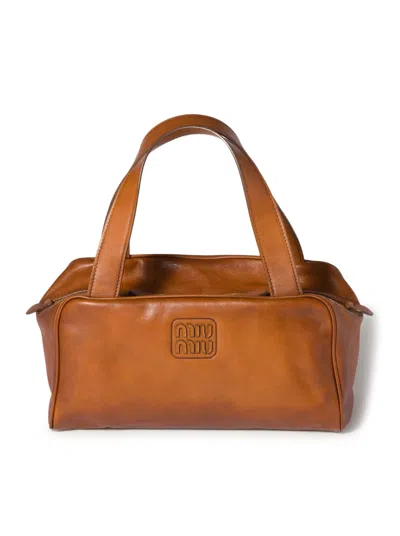 Miu Miu Leather Top Handle Bag In Brown