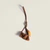 Miu Miu Flower Leather Keyring In Brown