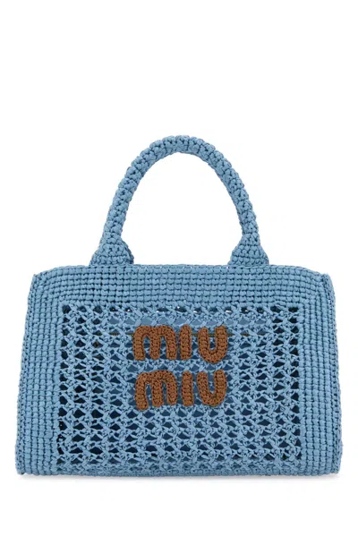 Miu Miu Handbags. In Blue