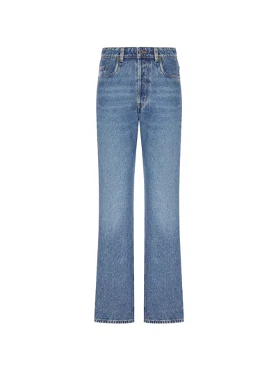 Miu Miu Light Wash Denim Flare Jeans In Blue