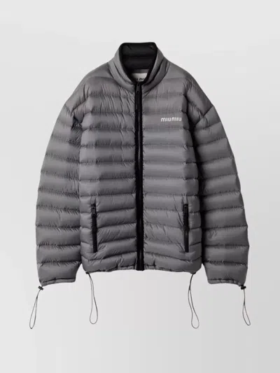 MIU MIU LIGHTWEIGHT PUFFER JACKET DRAWSTRING FEATURES