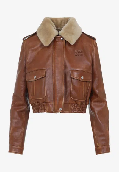 Miu Miu Logo-applique Leather Bomber Jacket In Brown