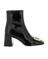 Miu Miu Side Zipper Boots In Black