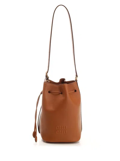 Miu Miu Logo In Brown