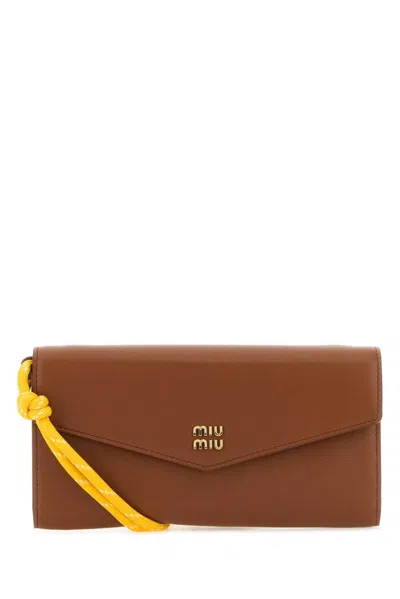 Miu Miu Logo In Brown