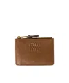 Miu Miu Embossed-logo Card Holder In Brown
