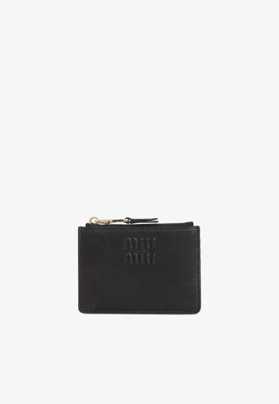 Miu Miu Logo Embossed Leather Cardholder In Black