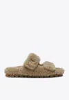 Miu Miu Logo Embossed Shearling Slides In Nude