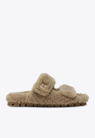 Miu Miu Logo Embossed Shearling Slides In Nude