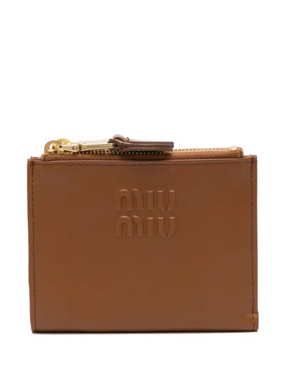 Miu Miu Logo-embossed Wallet In Brown