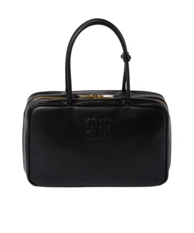 MIU MIU MIU MIU LOGO-EMBOSSED ZIPPED HANDBAG